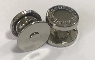 Double-rivet magnetic snap with a custom zinc alloy cover, silver finish, available for wholesale with customizable size, magnetic strength, color, and logo.