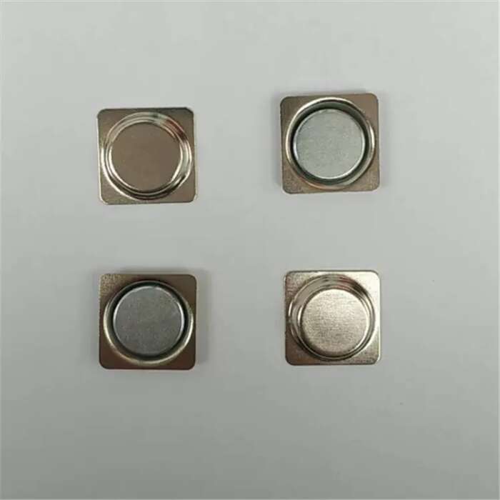 Multiple square magnetic name tags arranged for product display