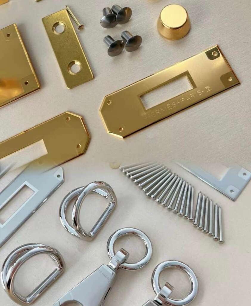 Luxury branded metal plates and turn locks as purse closure components.