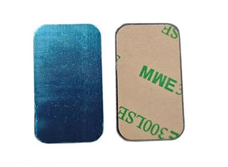 Various sizes of rectangular silver adhesive magnetic metal plates with blue protective film and 3M 300LSE backing.