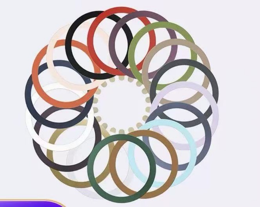 Multiple colorful Universal Magnetic Metal Ring Plate arranged in a circular pattern, demonstrating customized color spraying surface finish options.