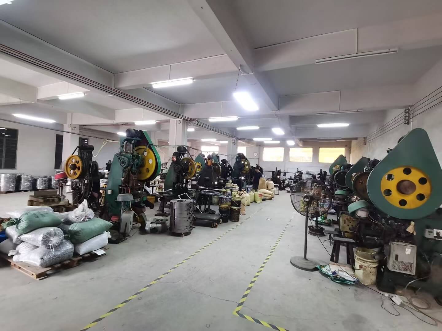 Advanced Machinery for Magnetic Snap Button Closure Production Modern machinery in Richarms factory used for manufacturing precision metal fittings and magnetic snaps for bags and accessories and all purpose