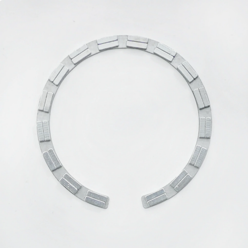 Open C-shape double-row segmented less-iron magnetic ring assembly for wireless charging insert molding