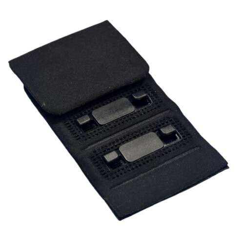 Textile-backed three-position clasp shown partly closed, with black rigid mating components visible.